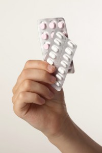 Kind mit Tabletten